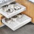 Housolution Organizador de Ollas y Sartenes, Extensible Organizador Tapas Ollas con 14 Compartimentos Ajustable, Soporte Tapas Ollas y Sartenes para Cocina, Bronce